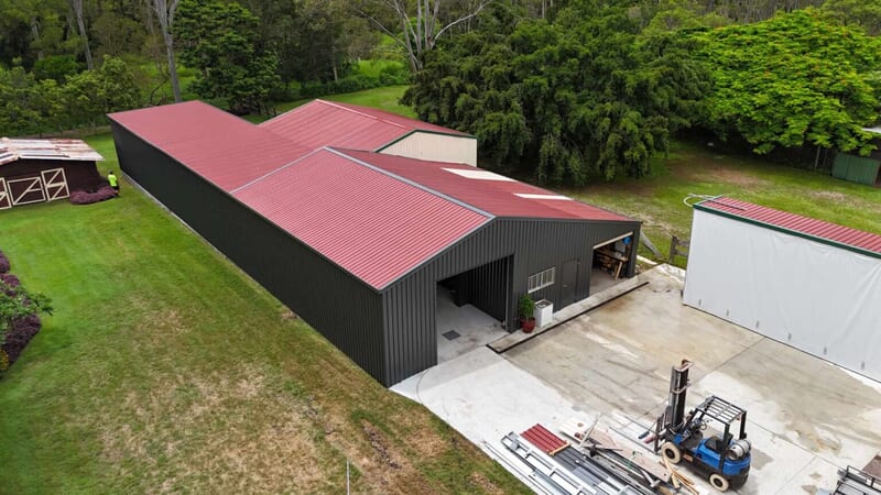 Aerial view of a long shed with awning bays